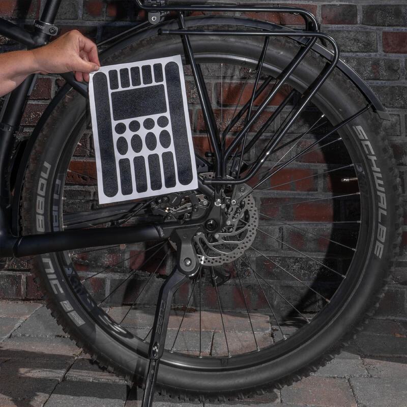Protecção anti-riscos para o suporte de bicicletas