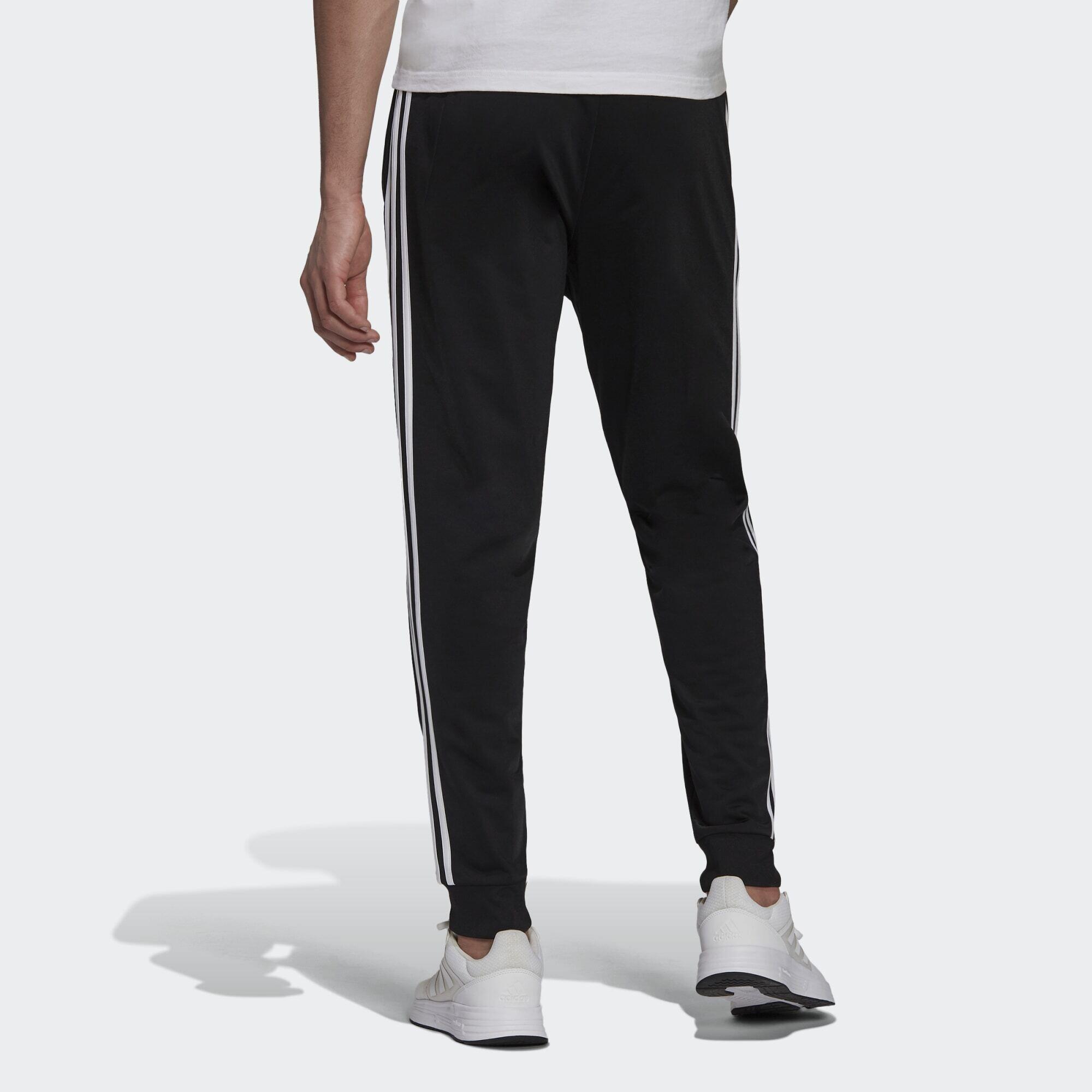 Pantalon de survêtement Primegreen Essentials Warm-Up Tapered 3-Stripes 3/5