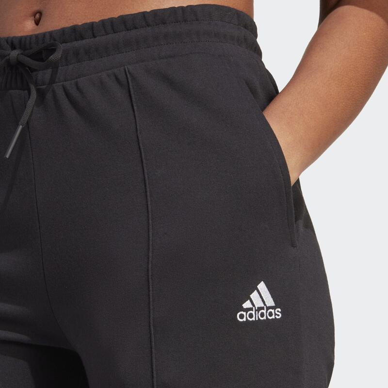 Pantalon taille haute avec jambes évasées et imprimé adidas intégral