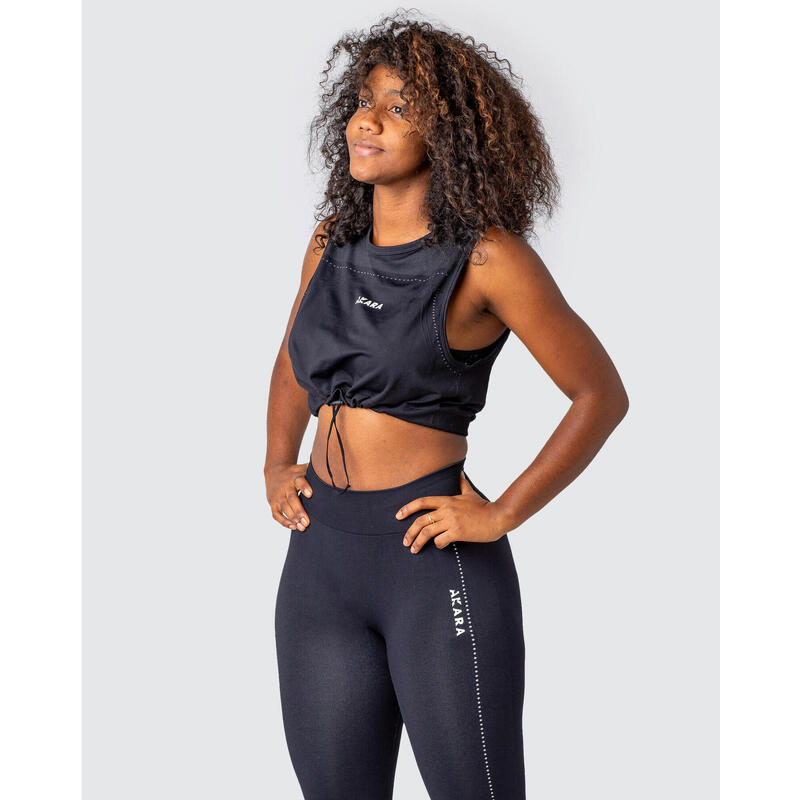 SLIM mouwloos t-shirt, fitness vrouw in het zwart