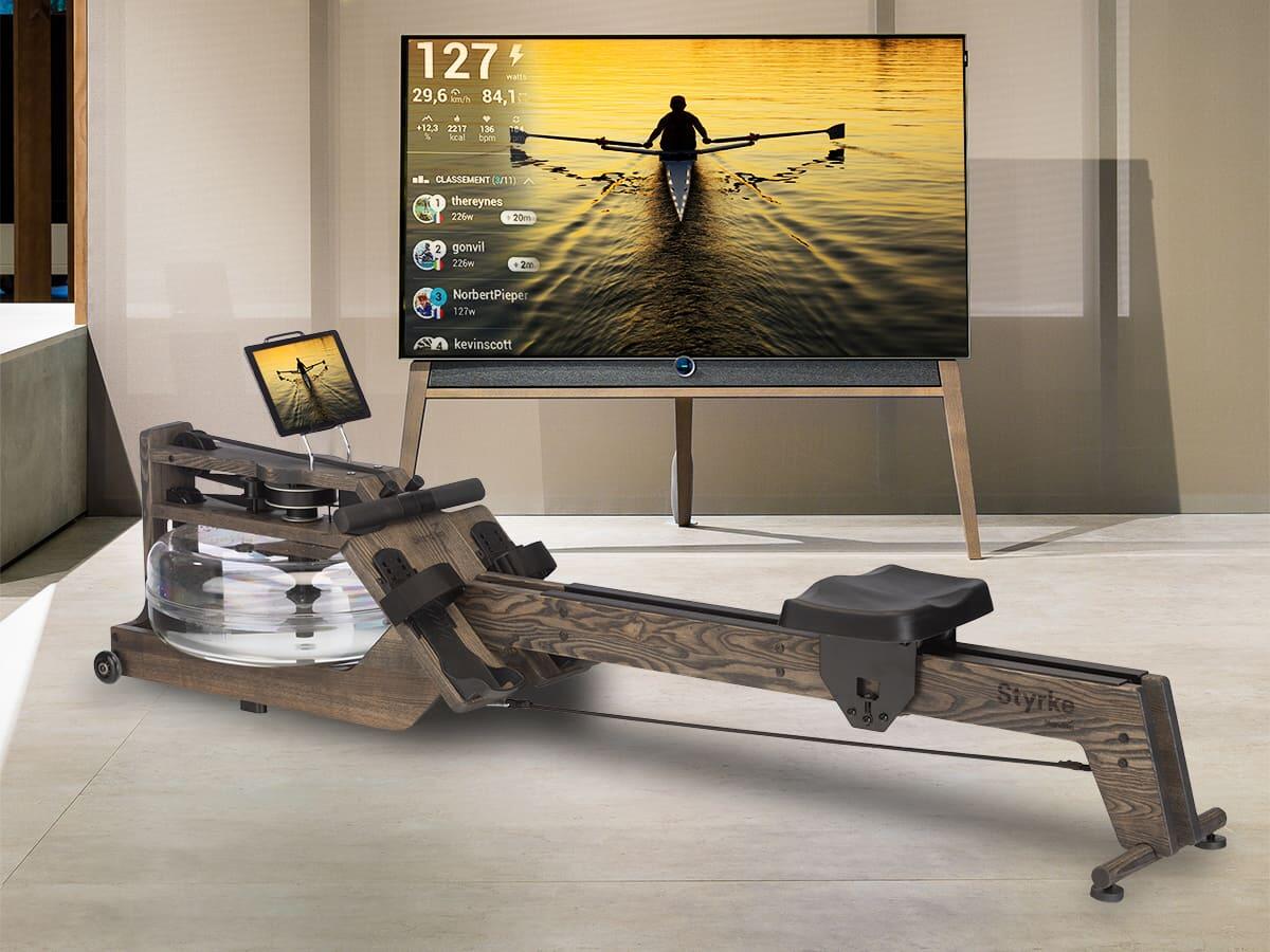 Skandika Rameur à Eau Styrke Premium | Made in Germany, en Bois, connecté App Kinomap, rameur d'appartement en pin d'Autriche, jusqu'à 180 kg Skandika Rameur à Eau Styrke Premium | Made in Germany, en Bois, connecté App Kinomap, rameur d'appartement en pin d'Autriche, jusqu'à 180 kg