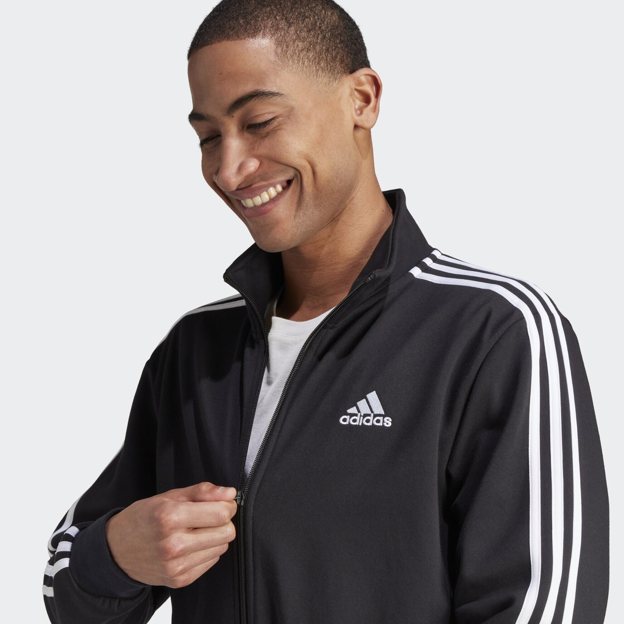 Adidas the brand with top the 3 stripes tuta