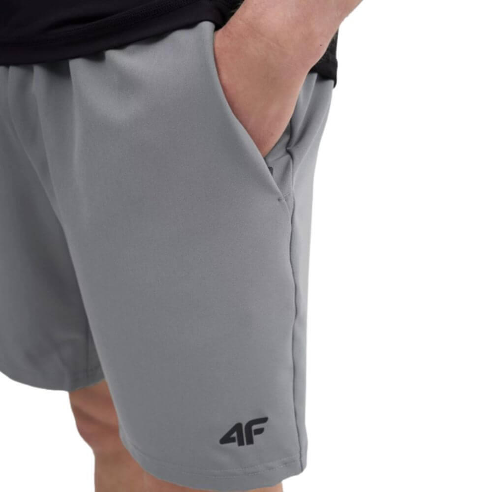 PANTALONES CORTOS DE RUNNING PARA HOMBRE 4F TFSHM147. Gris 3/4