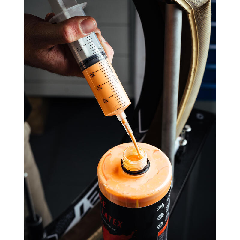 Liquide préventif d'étanchéité anti-crevaison tubeless - PMP orange latex