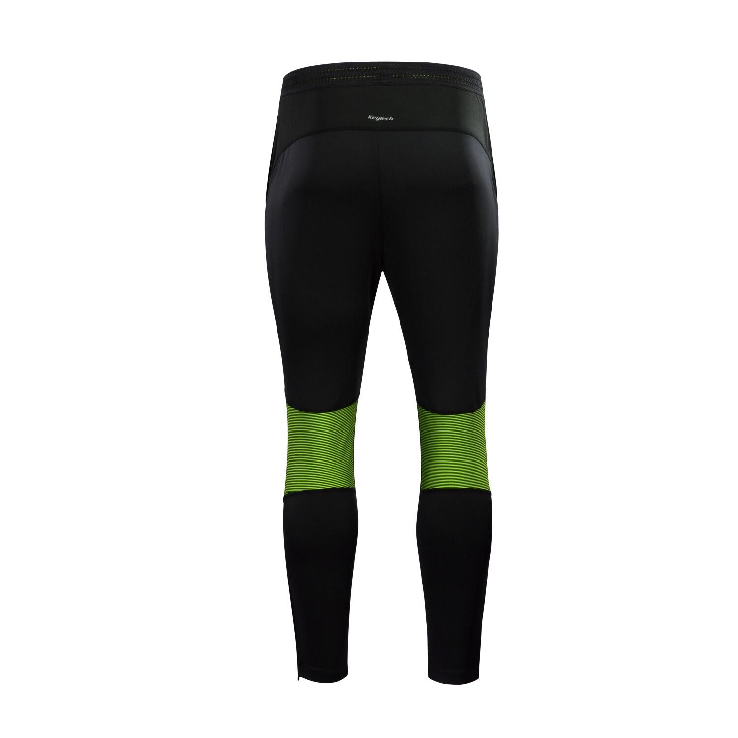 Pantalón Largo Unisex Kelme Montes  Color Negro Y Amarillo 2/5