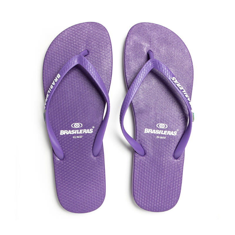 Lila dames teenslippers met antislipzool van rubber.