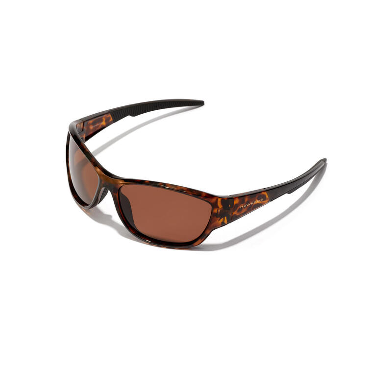 HAWKERS - Lunettes de soleil pour Homme et Femme POLARIZED CAREY BROWN - RAVE