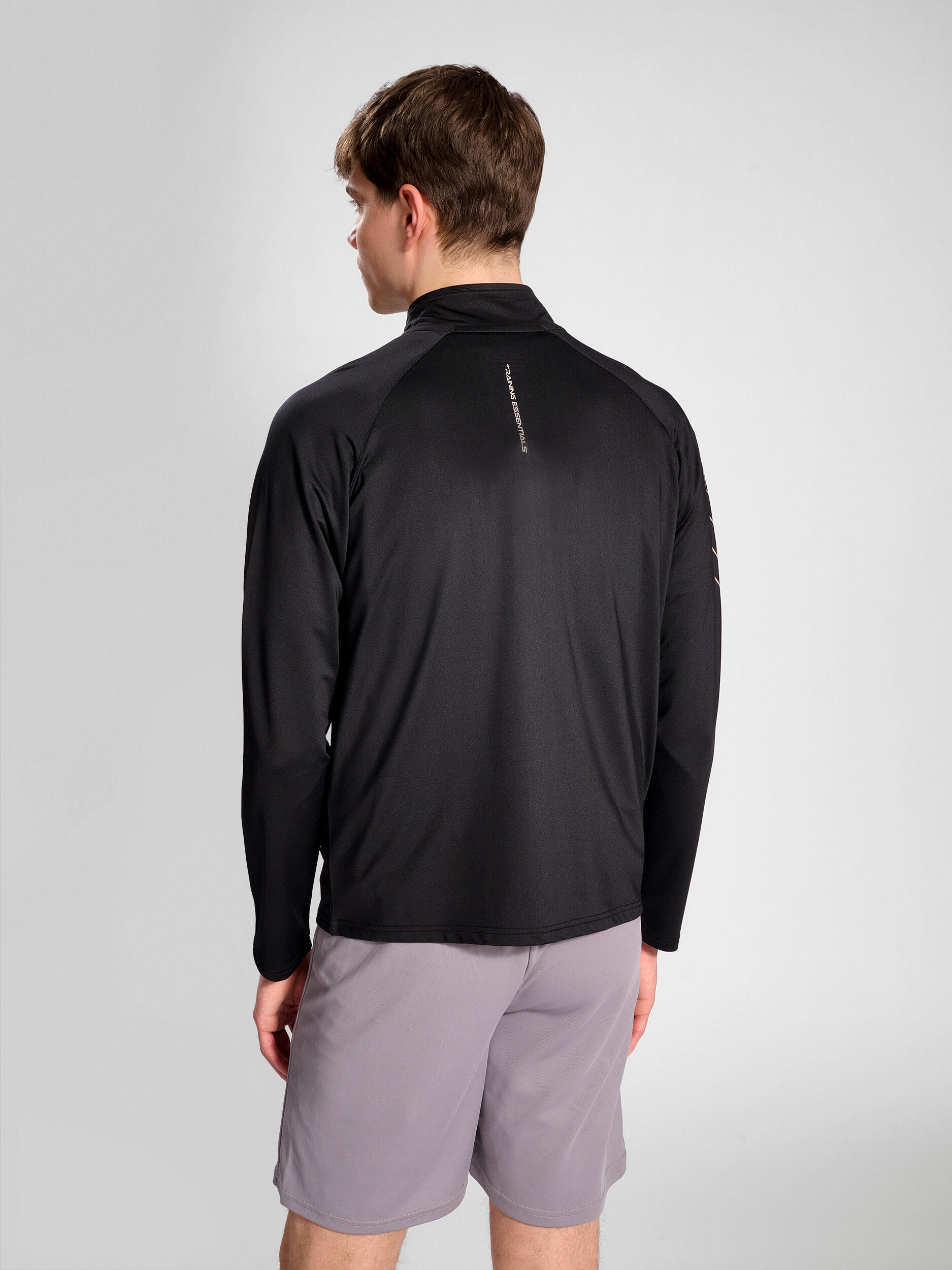 Enfiler Zip Combinaison Hmlte Strength Homme 3/7
