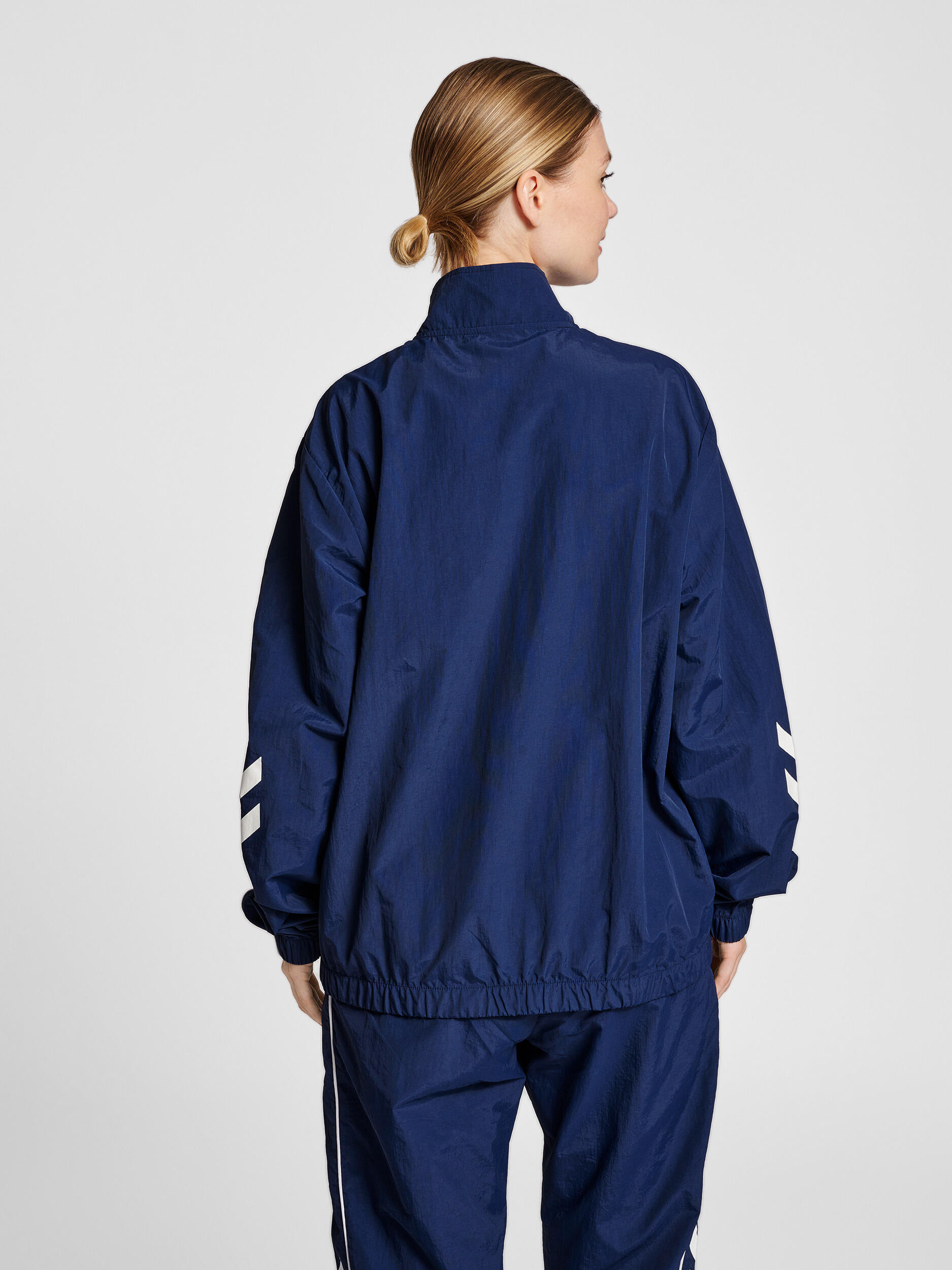 Rits Zip Jasje Hmllgc Celab Unisex Volwassene HUMMEL 5/7