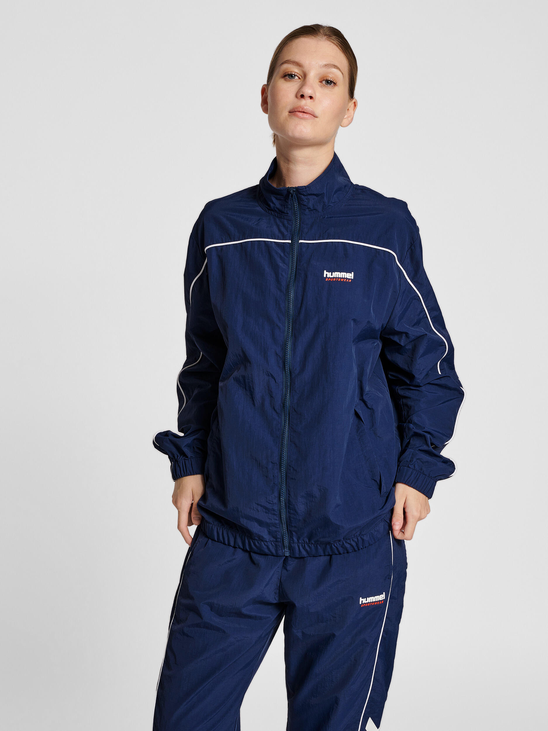 Rits Zip Jasje Hmllgc Celab Unisex Volwassene HUMMEL 3/7