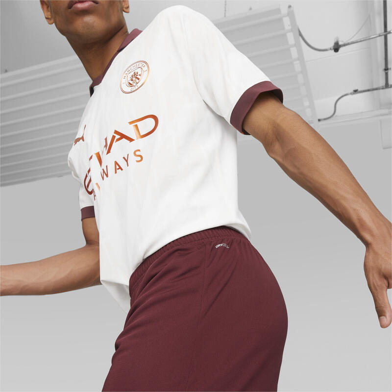 Shorts de fútbol Manchester City PUMA Aubergine Cayenne Pepper Purple Orange