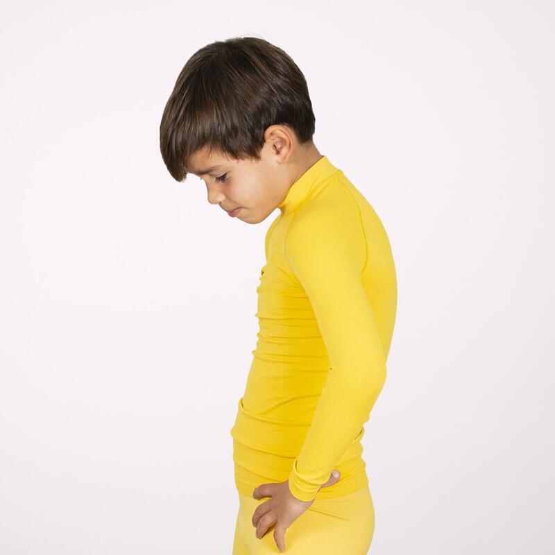 Die langärmelige gelbe thermische Fußballunterwäsche für Kinder