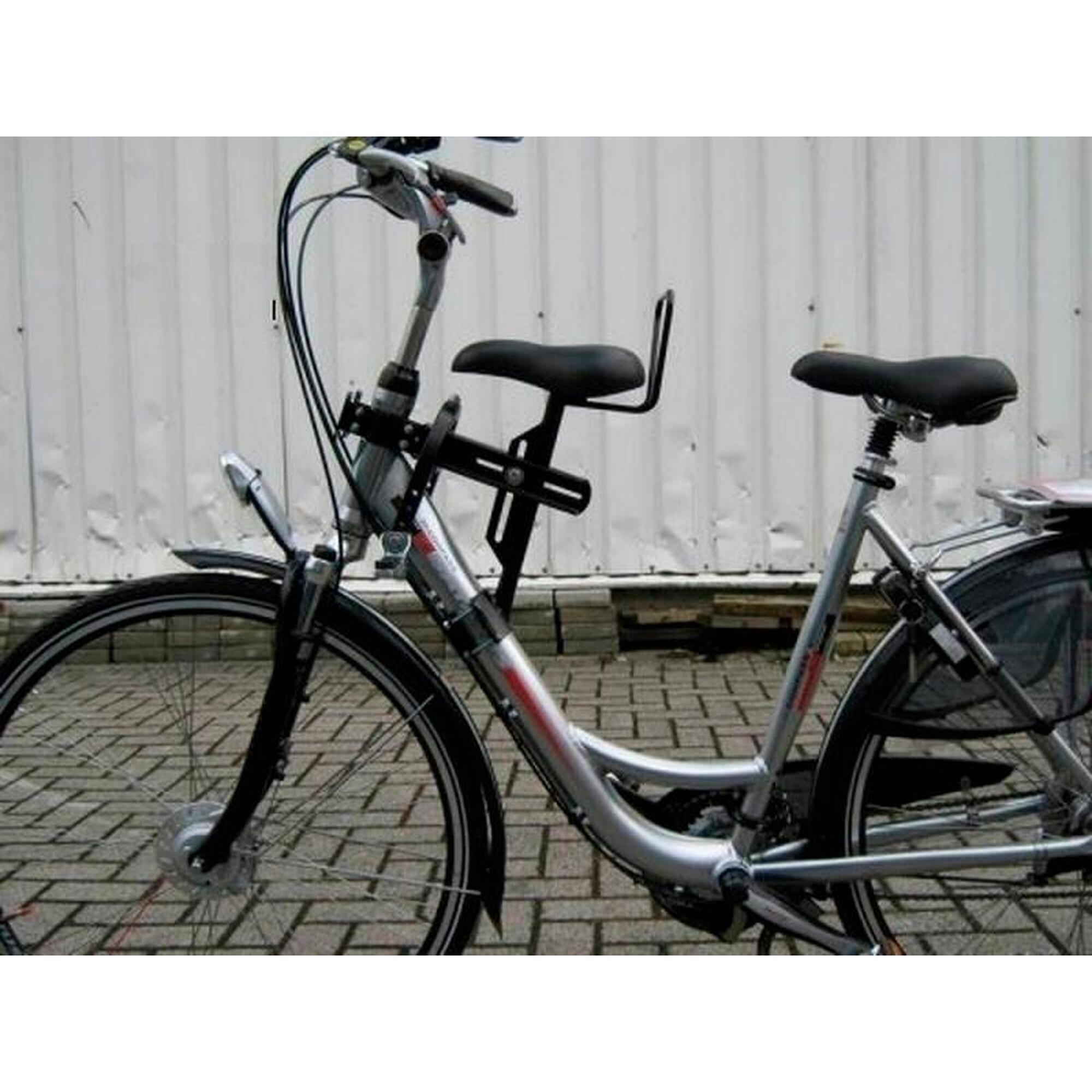 Zadel kinderzitje op buis damesfiets