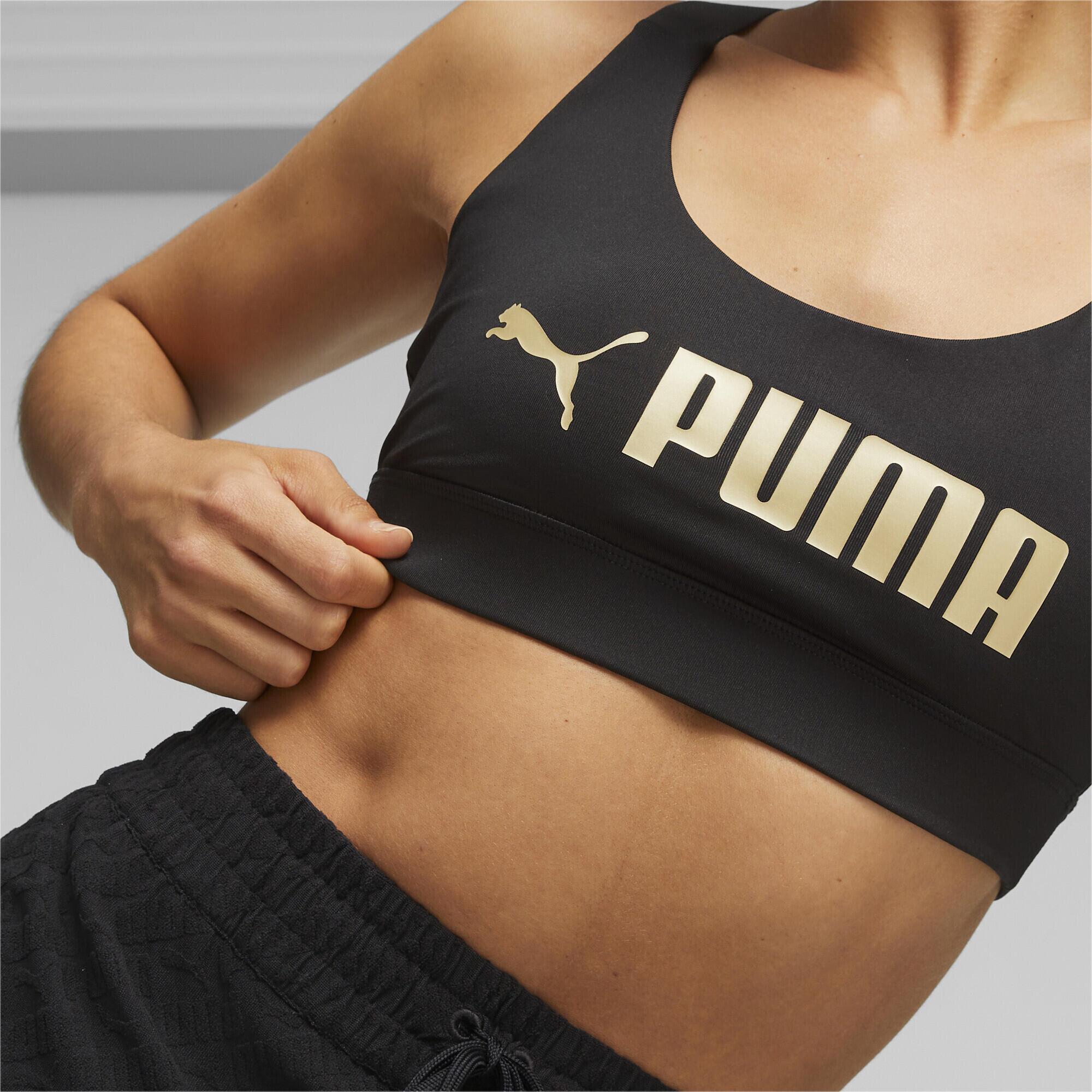 PUMA Fit Mid Support Trainings-BH Damen PUMA Black Gold 5/6