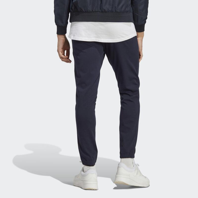 Pantalon fuselé élastique en jersey avec logo Essentials