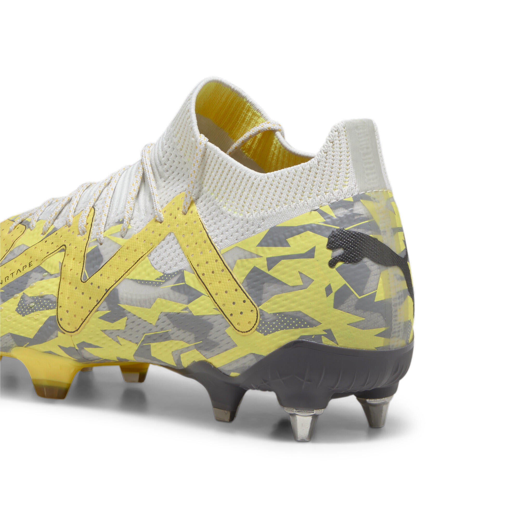 grey and yellow football boots