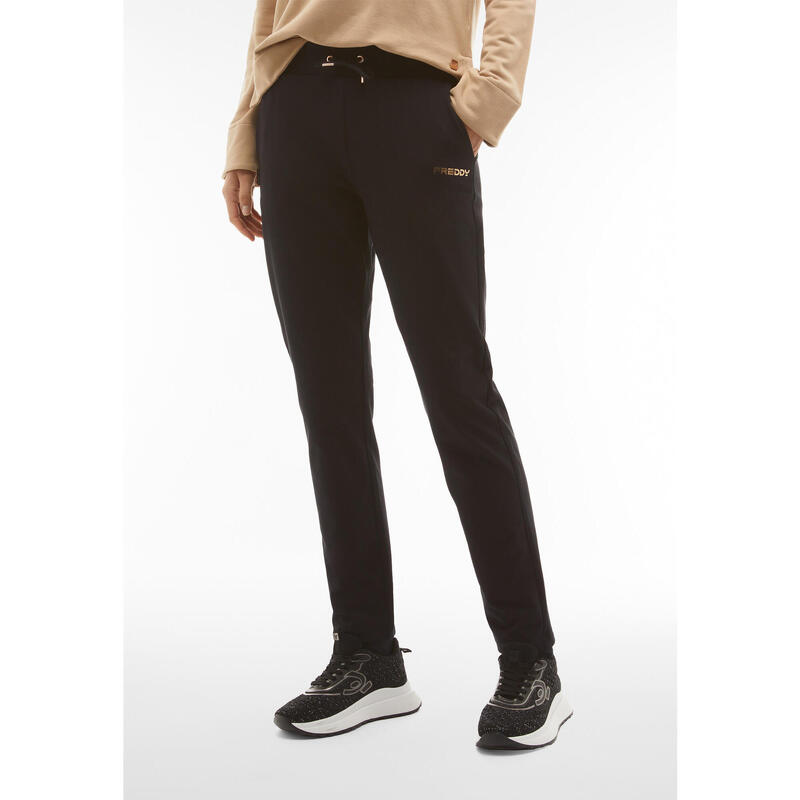 Pantalon en molleton avec détails en bronze et coupe droite aux chevilles.