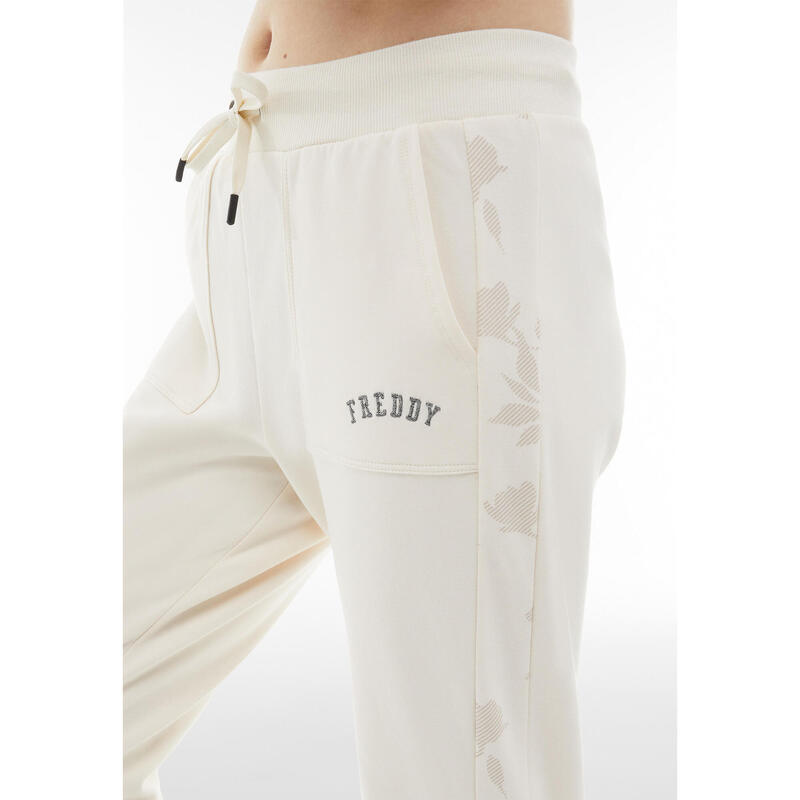 Pantaloni in felpa con banda stampata floreale in tono