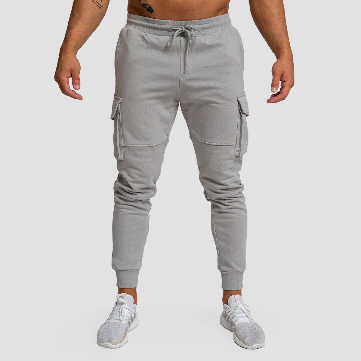 GYMBEAM Tepláky pánské fitness slim fit TRN s kapsami u stehen