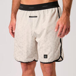 Short de beach-volley pour hommes avec un motif de plumes de paon.