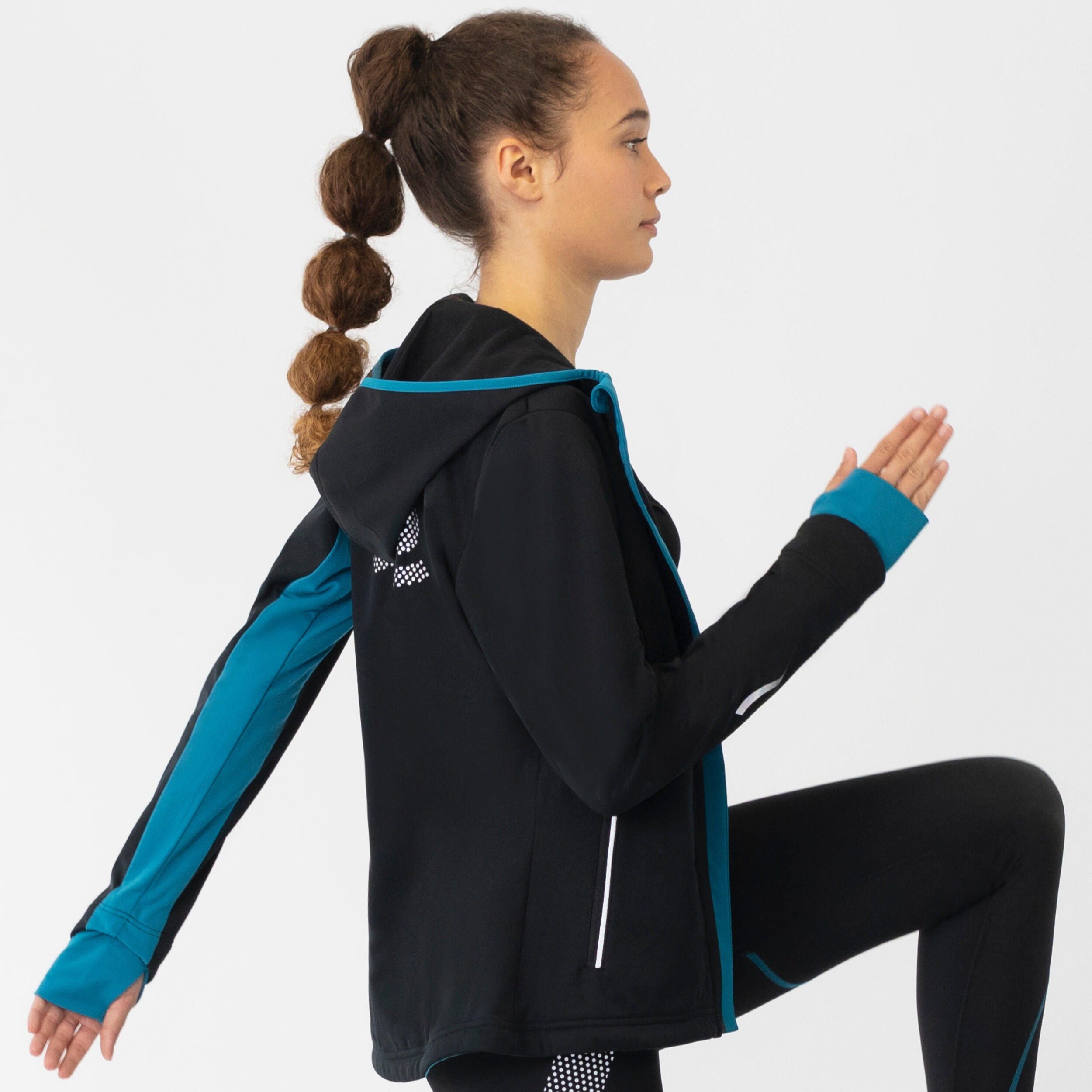 Wasserdichte und warme Damen Laufjacke mit Kapuze Bjarka 6/7