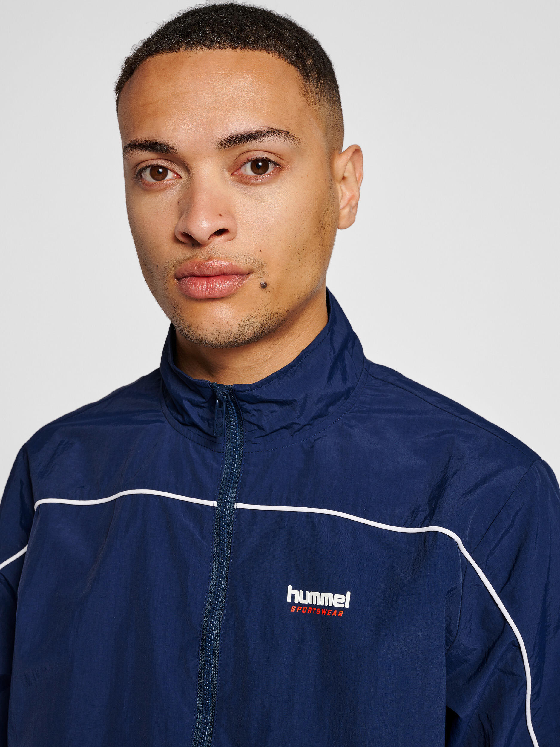 Rits Zip Jasje Hmllgc Celab Unisex Volwassene HUMMEL 6/7