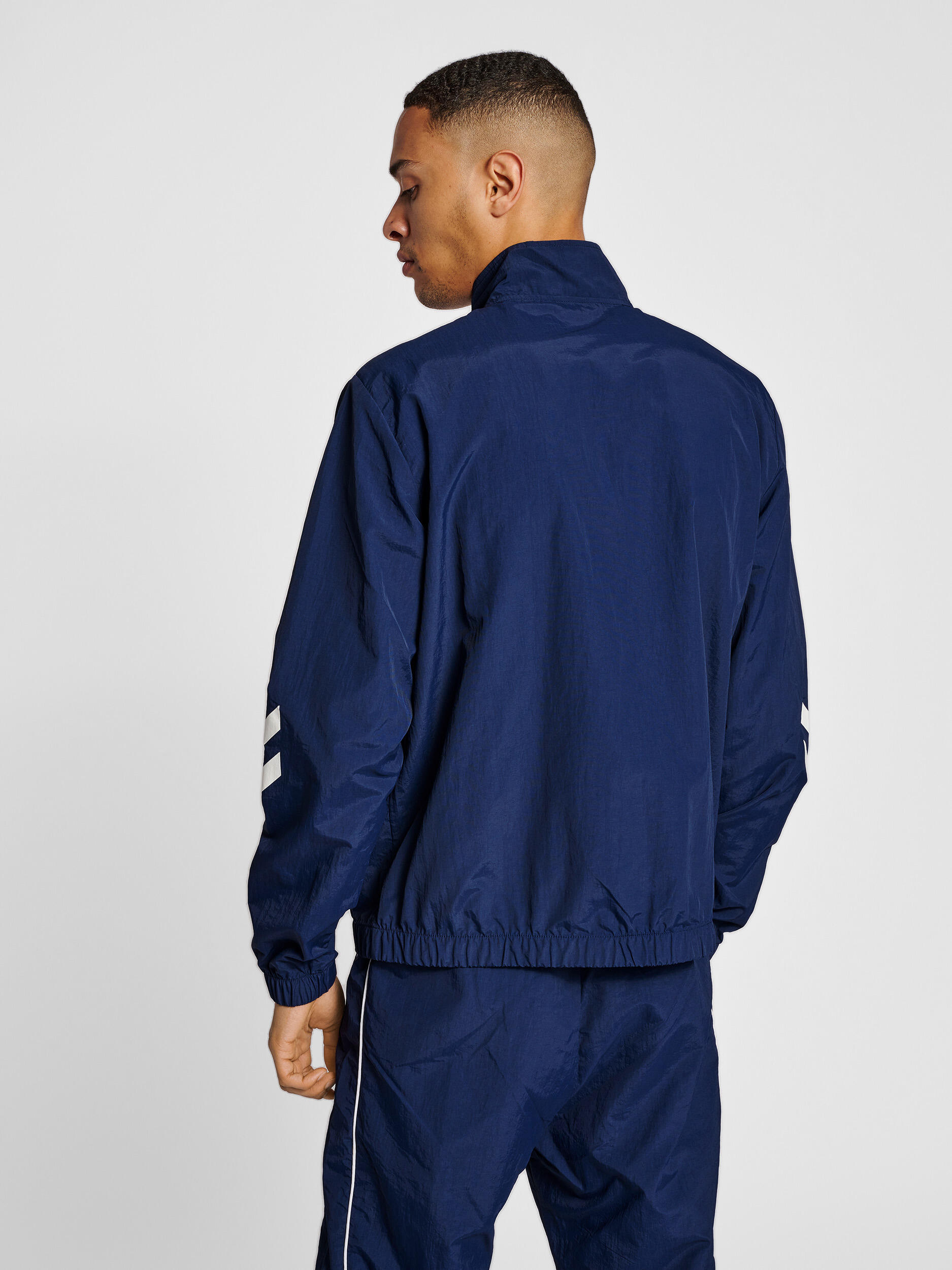 Rits Zip Jasje Hmllgc Celab Unisex Volwassene HUMMEL 4/7