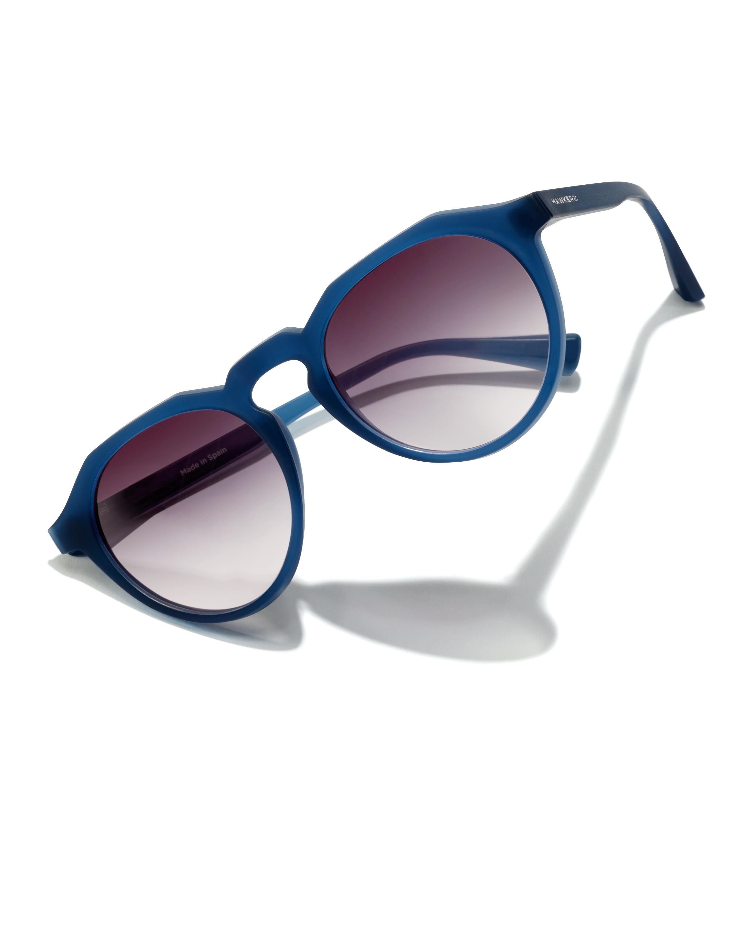 HAWKERS Zonnebrillen mannen en vrouwen NAVY TRANSPARENT IRON WARWICK RAW 3/8