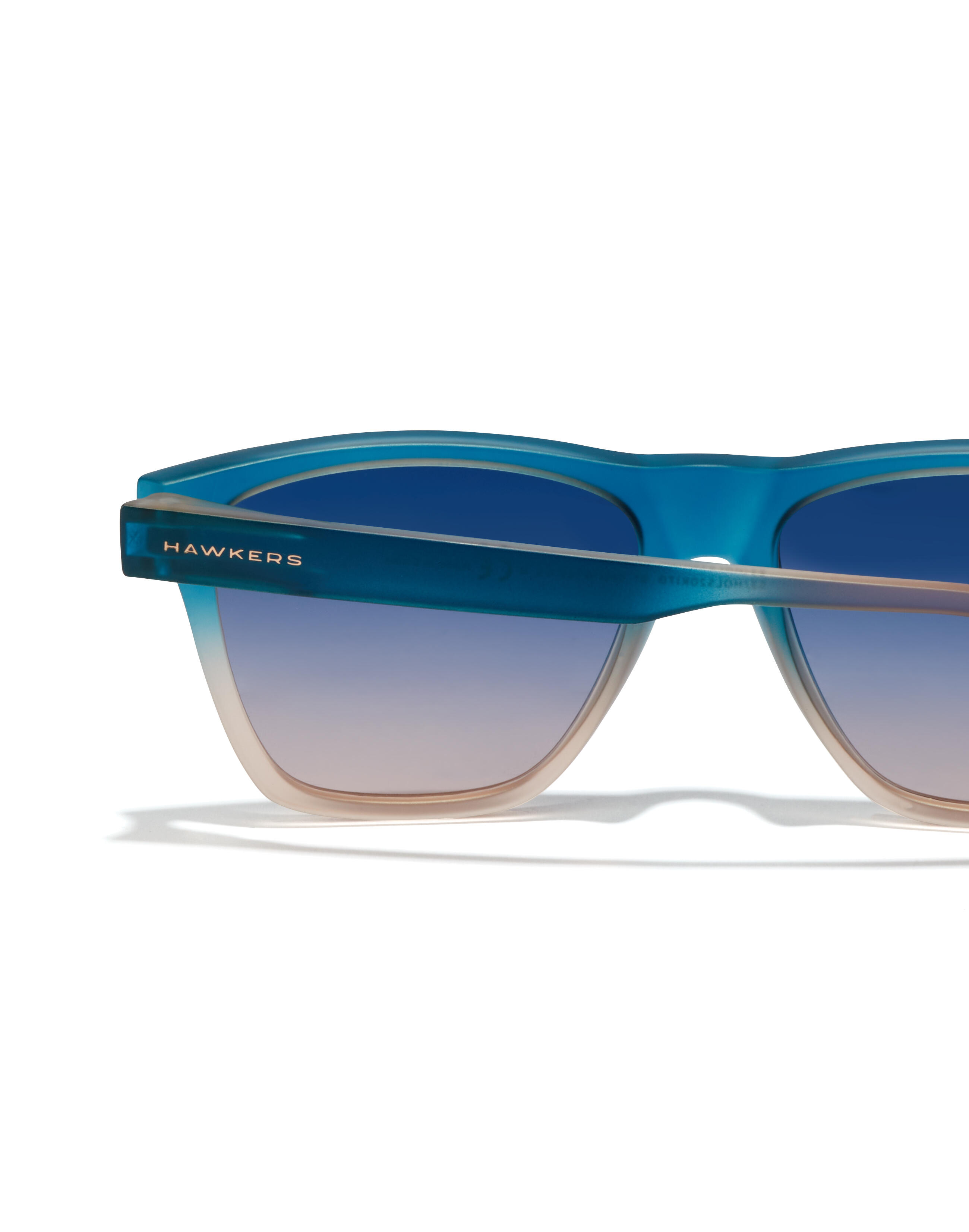 HAWKERS - Lunettes de soleil pour Homme et Femme Sunrise Bleu à Peach - ONE LS 4/8