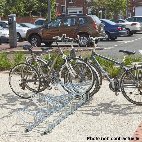 Range 6 vélos au sol face à face 1/2