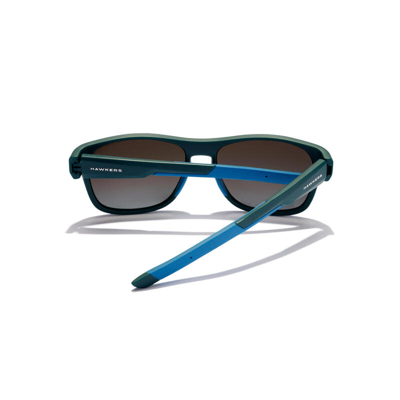 HAWKERS - Lunettes de soleil pour Homme et Femme tempête sarcelle noire - GRIP