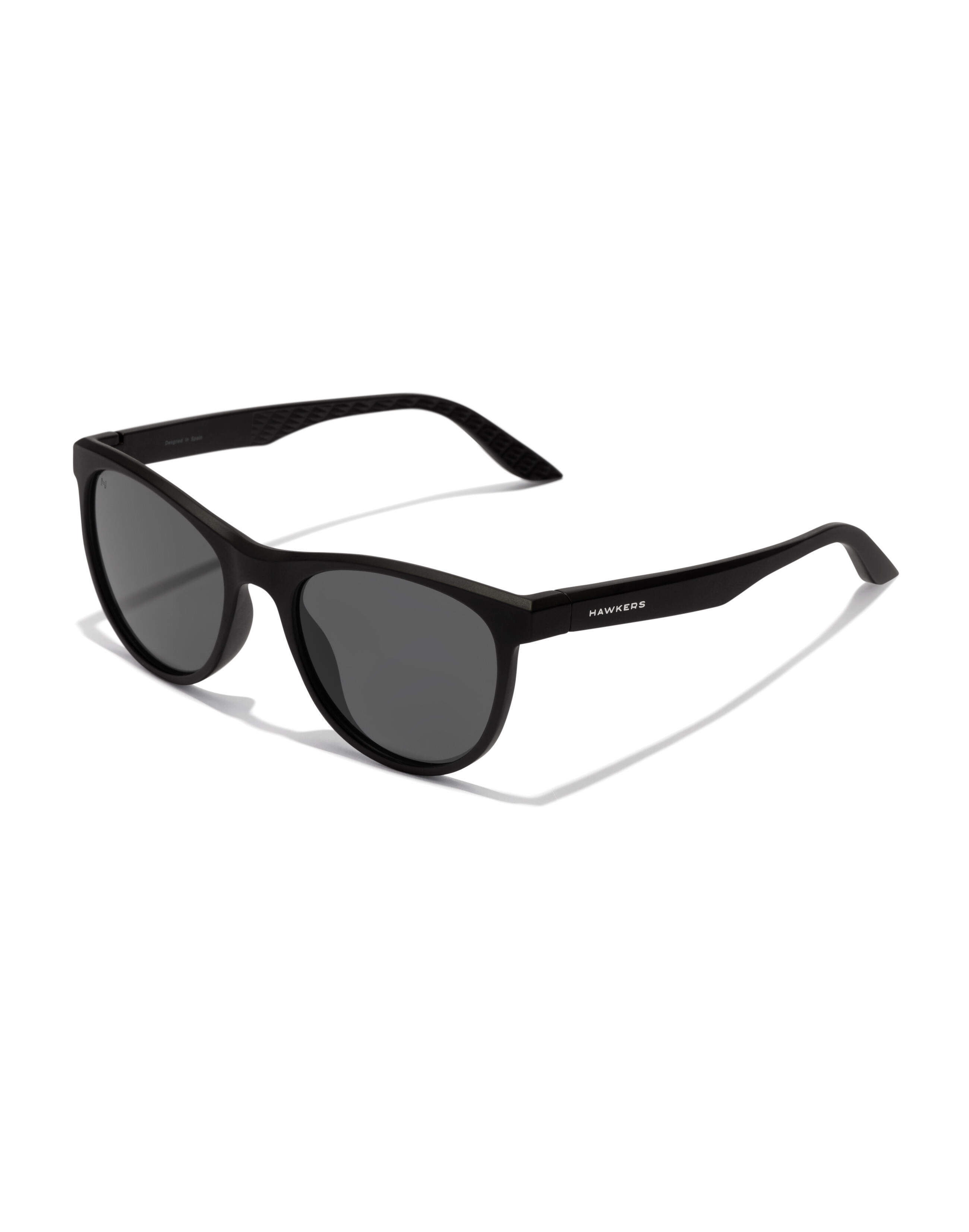 HAWKERS HAWKERS - Gafas de Sol para Hombre y Mujer POLARIZED BLACK DARK - TRAIL