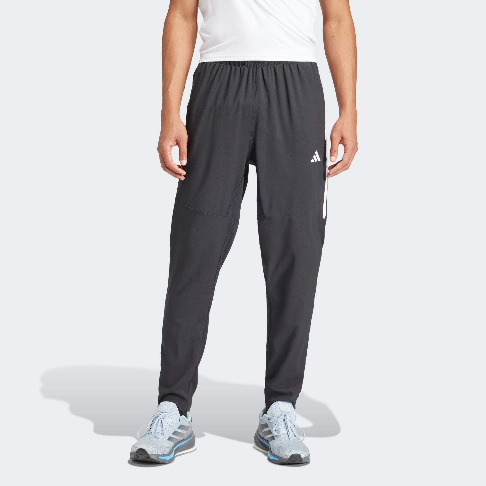 Pantaloni Own the Run cu 3 dungi