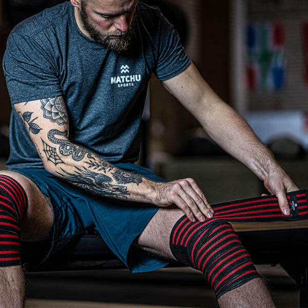 Knee wraps - Zwart/rood - Elastisch textiel 2/5