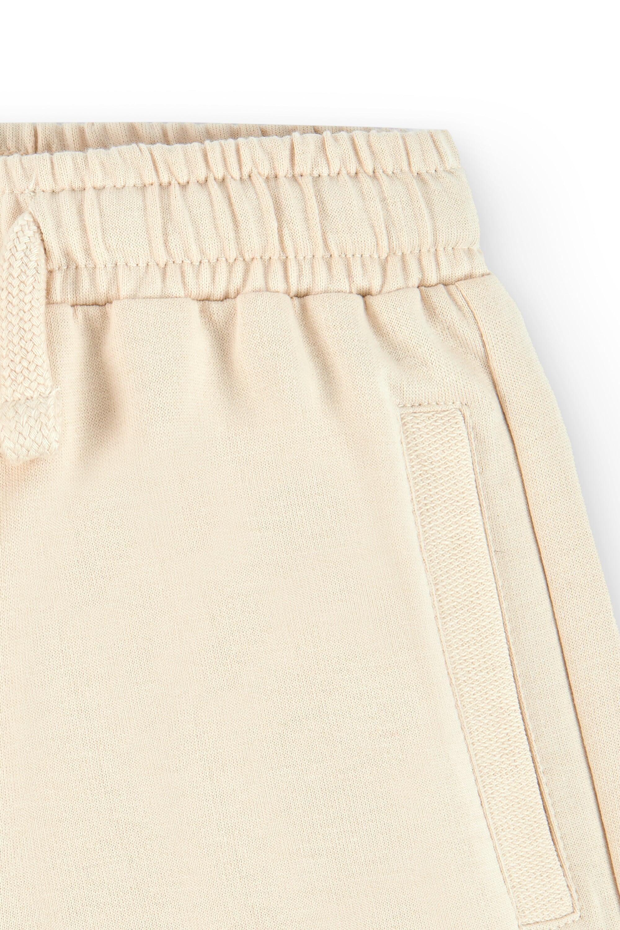 Bermuda niño beige cintura elástica 3/4