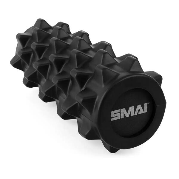 Black foam roller with a grid texture