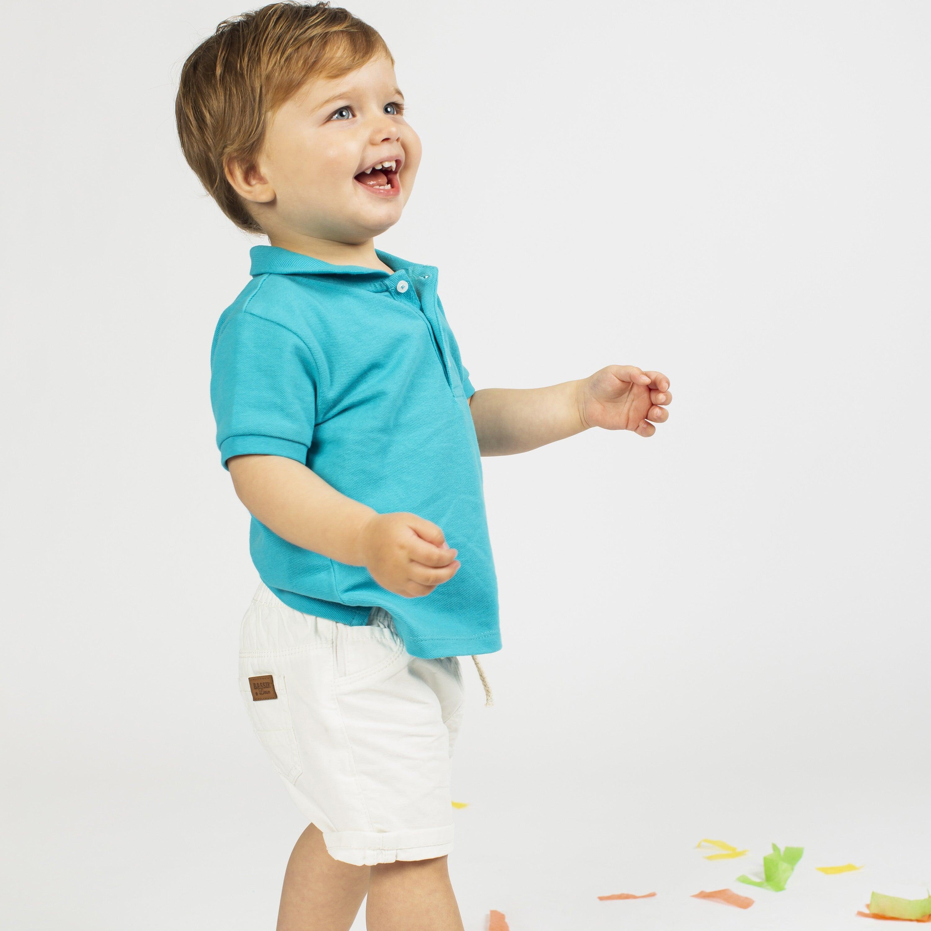Camisa polo turquesa para 5/5