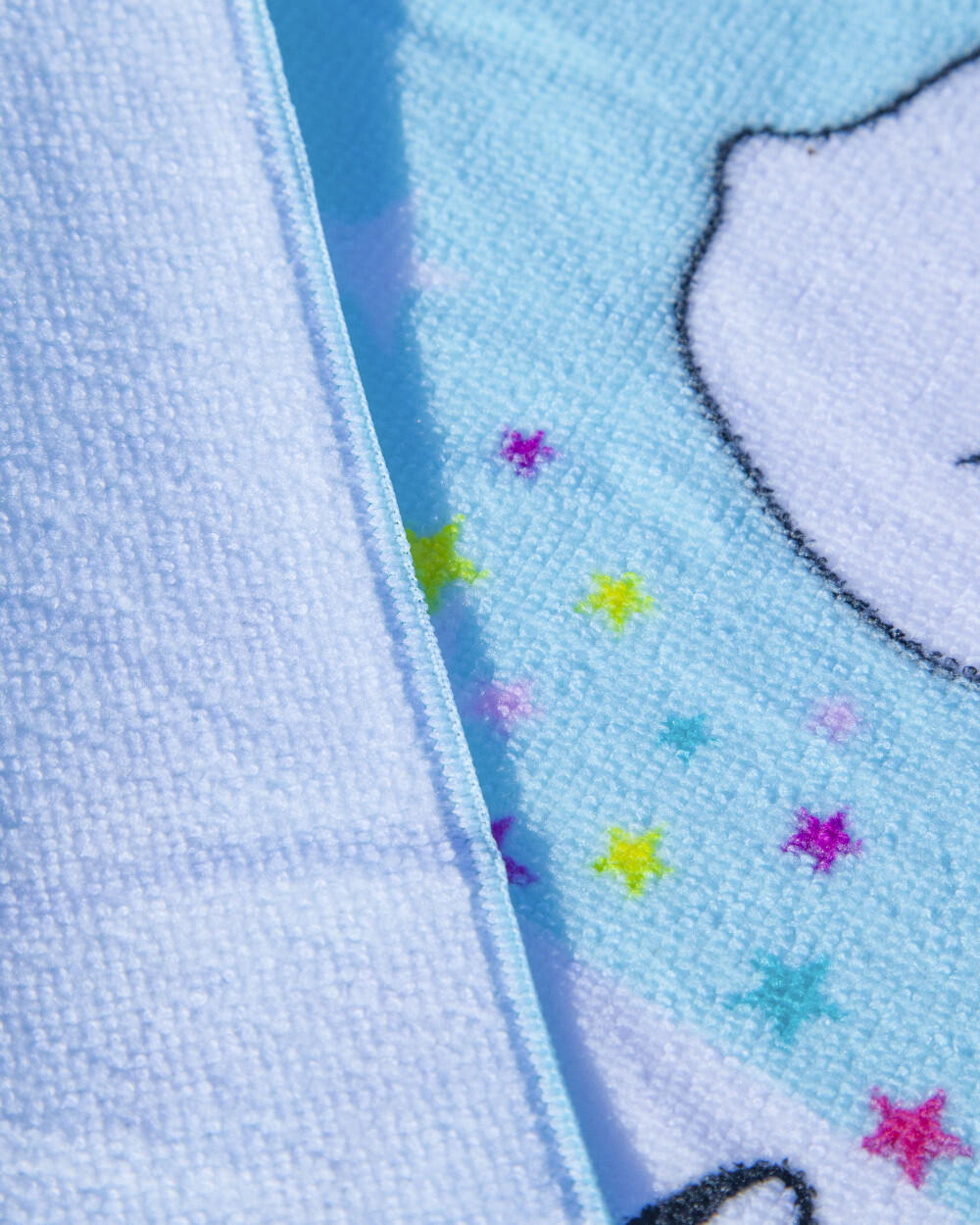 TURQUOISE EENHOORN KINDERPONCHO 4/4