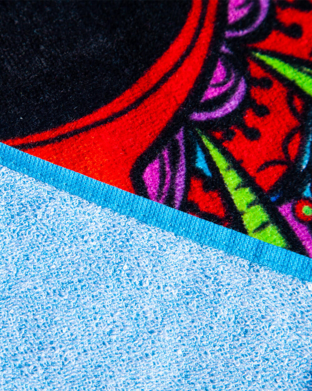 TOALLA ESTAMPADA CALAVERA TURQUESA 2/4