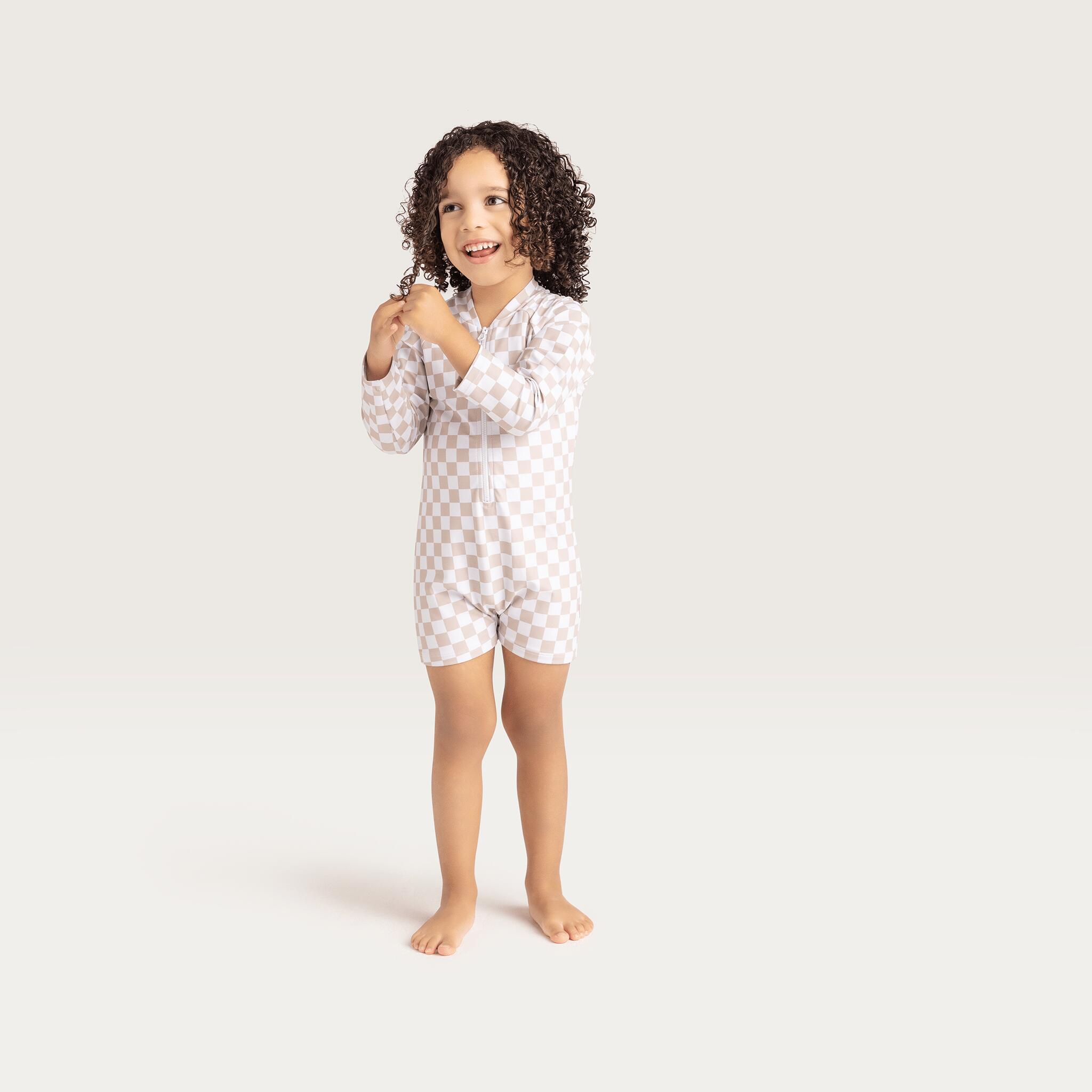 Swim Essentials | Muta Quadri Anti-UV Bambino Beige/Bianco 3/4