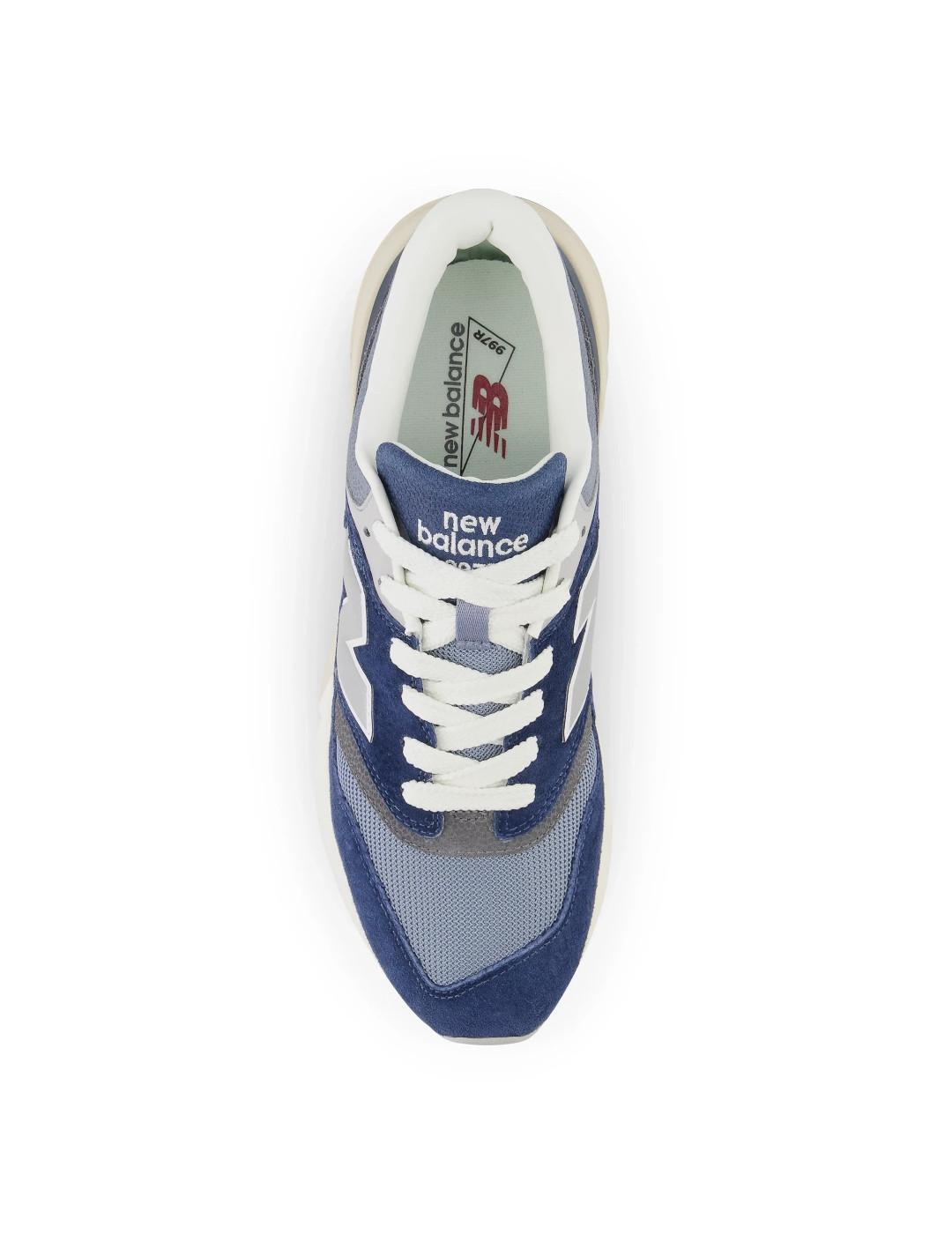 La traduction en français est : Mode/sportswear pour homme New balance Bleu 4/5