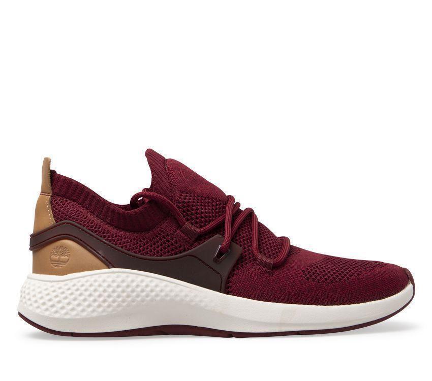 Men's flyroam go knit sneakers discount
