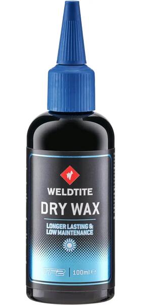 Bottle of dry chain wax lubricant
