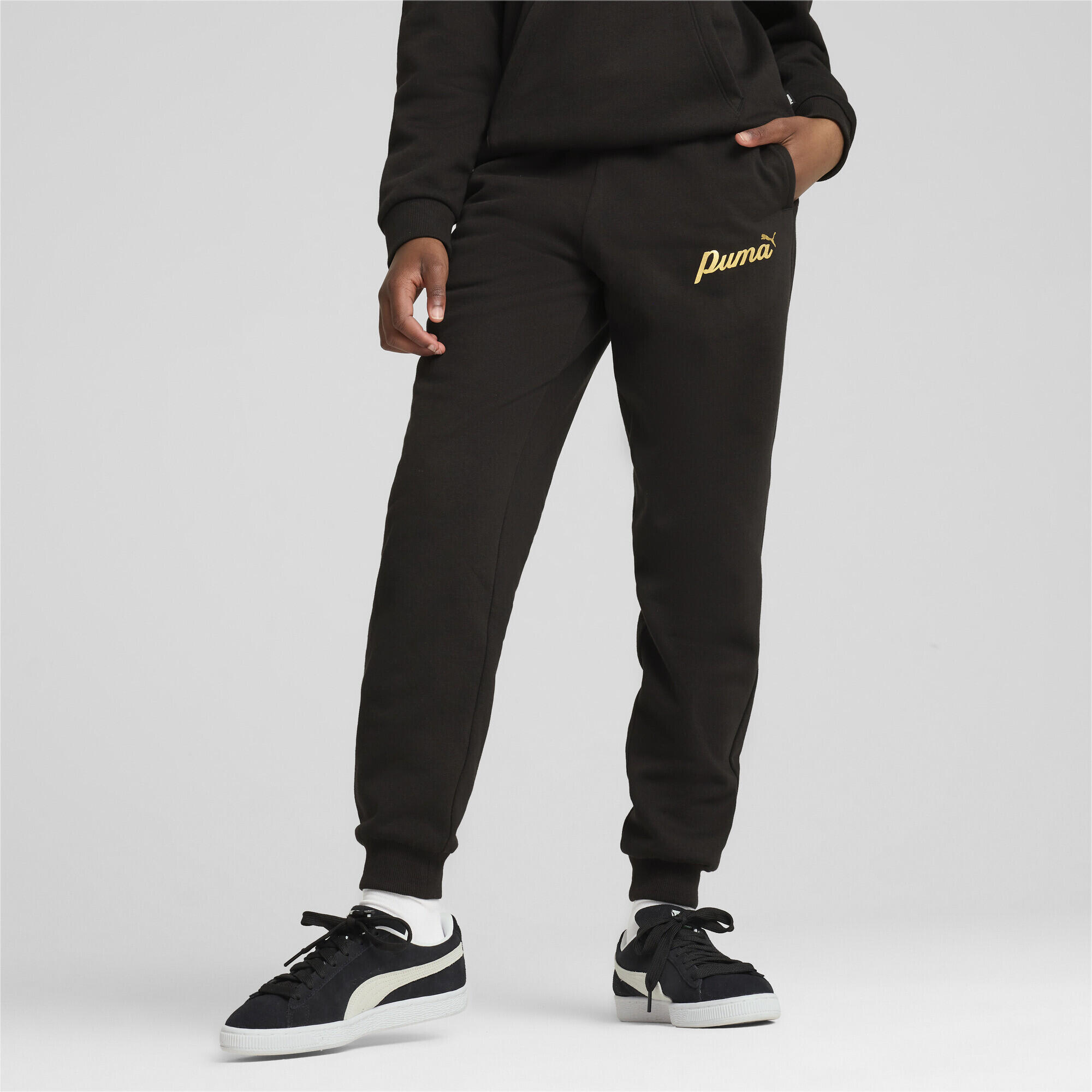 Pantalones ESS+ SCRIPT Niños PUMA Black Gold Foil 4/7