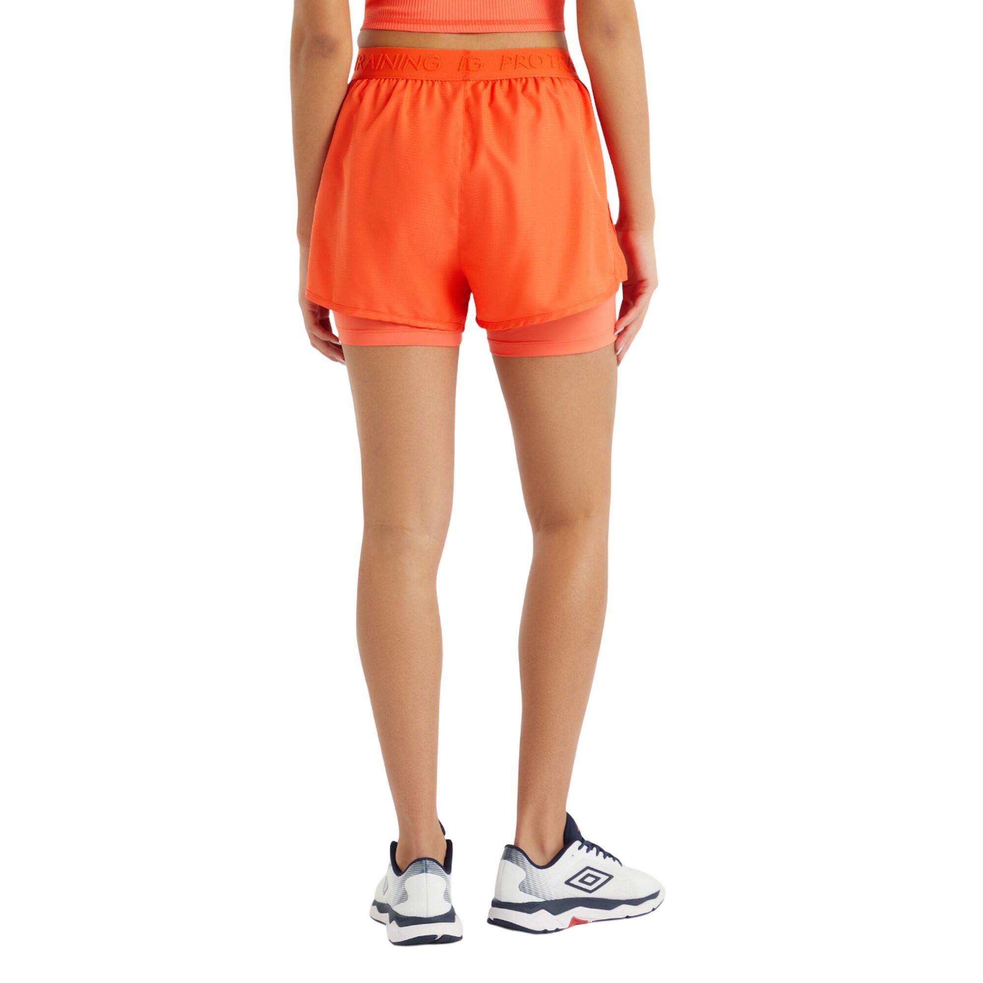 Pantaloncini Donna Umbro Pro Training Hybrid Corallo Caldo 2/3