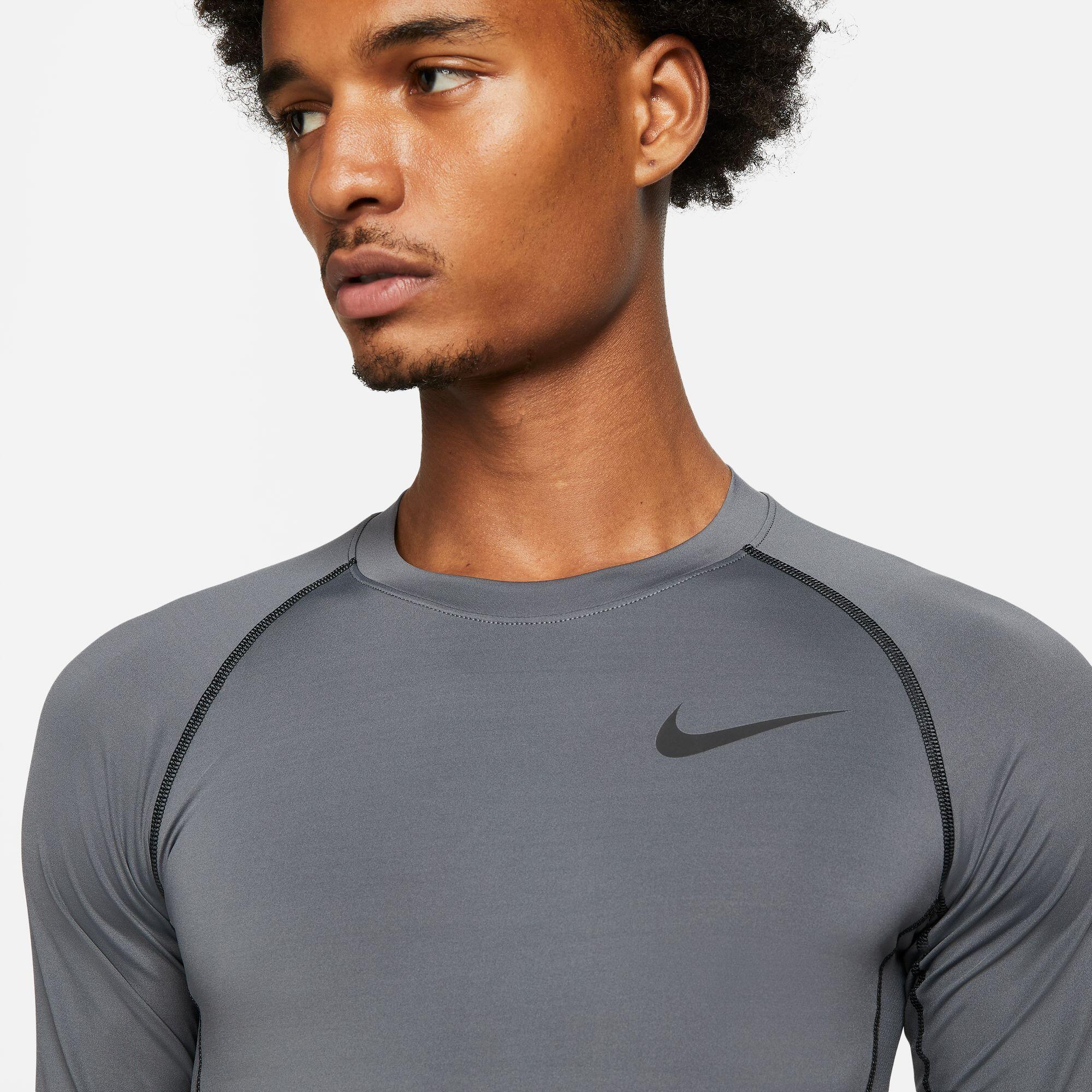Maglie maniche lunghe da palestra uomo nike grigio 3/4