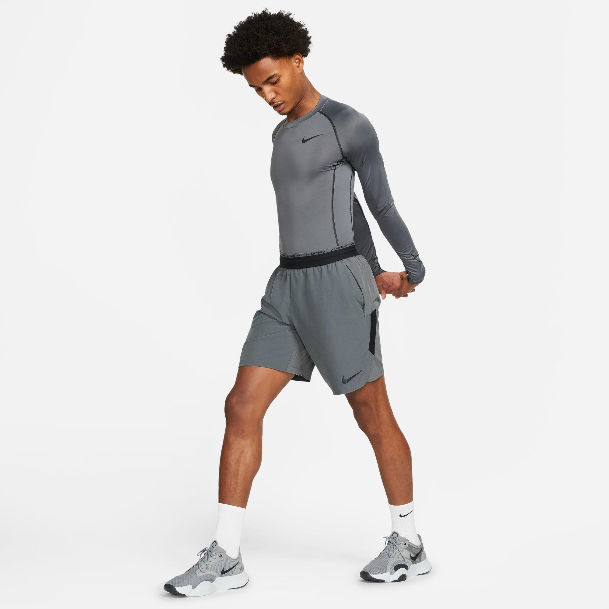 Maglie maniche lunghe da palestra uomo nike grigio 2/4