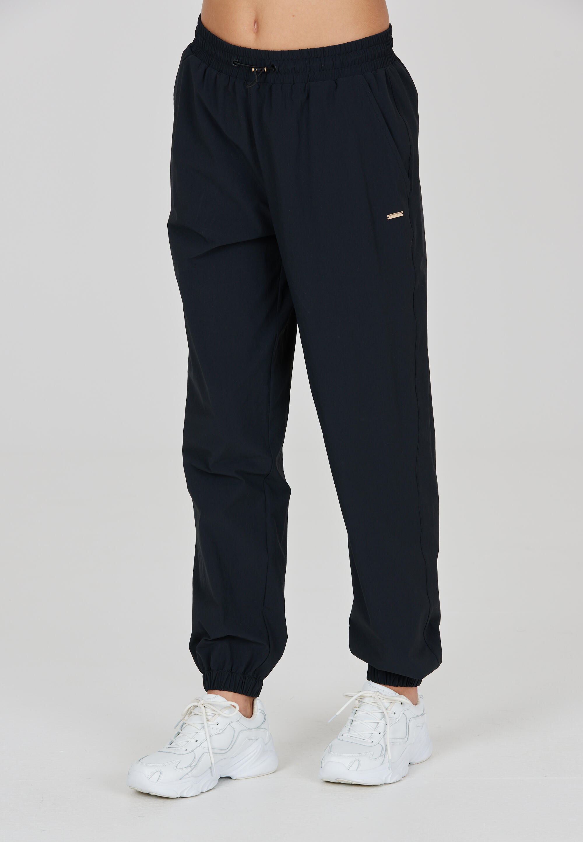 Damskie spodnie dresowe Athlecia Hero 4/5