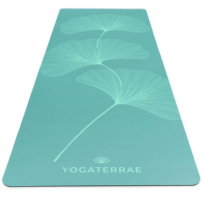 Vintage groene yogamat van pu en natuurlijk rubber met lichte ginkgo's yin yang