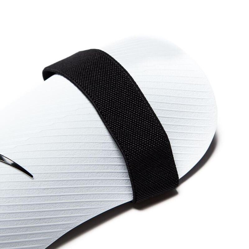 Aparatori unisex Nike Guard, Gri